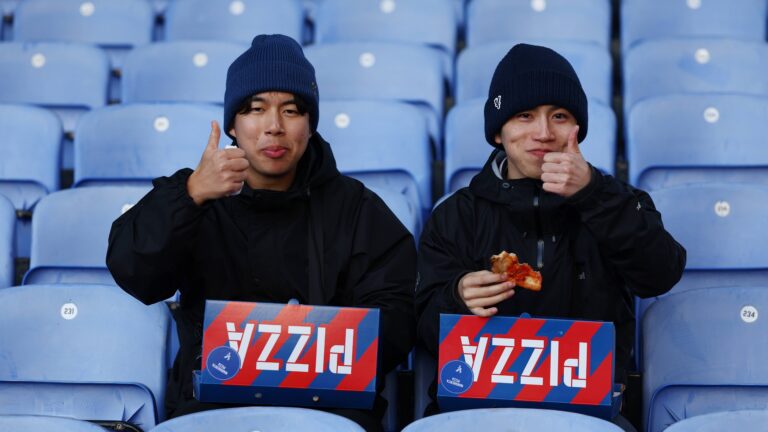 Crystal Palace fans eating pizza Newcastle United