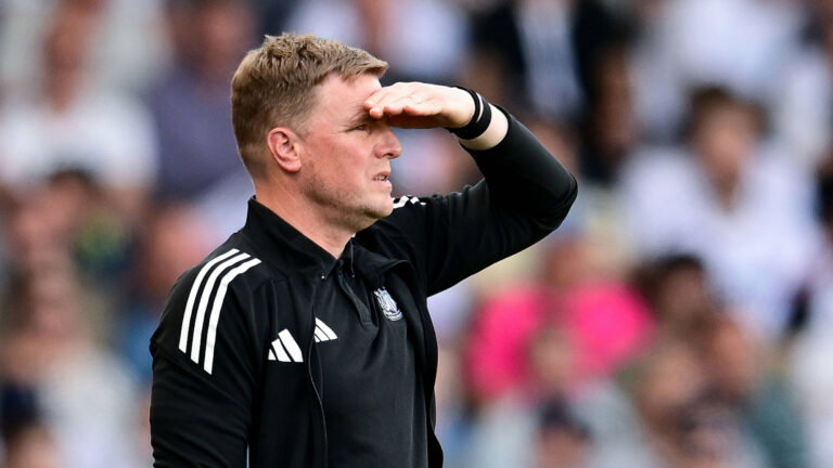 Eddie Howe shading eyes from sun Newcastle United Head Coach