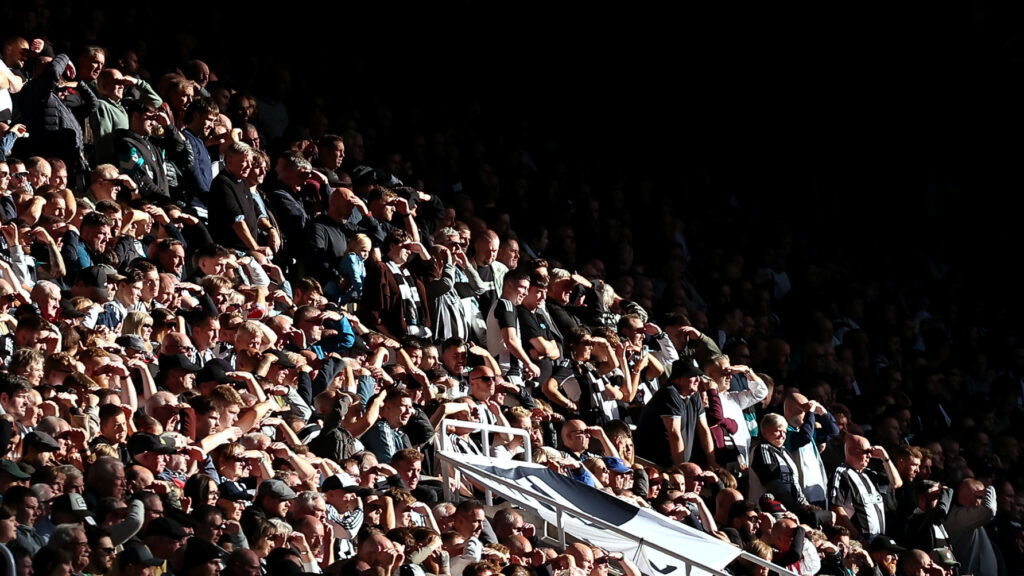 Newcastle Fans Shielding Eyes From Sun