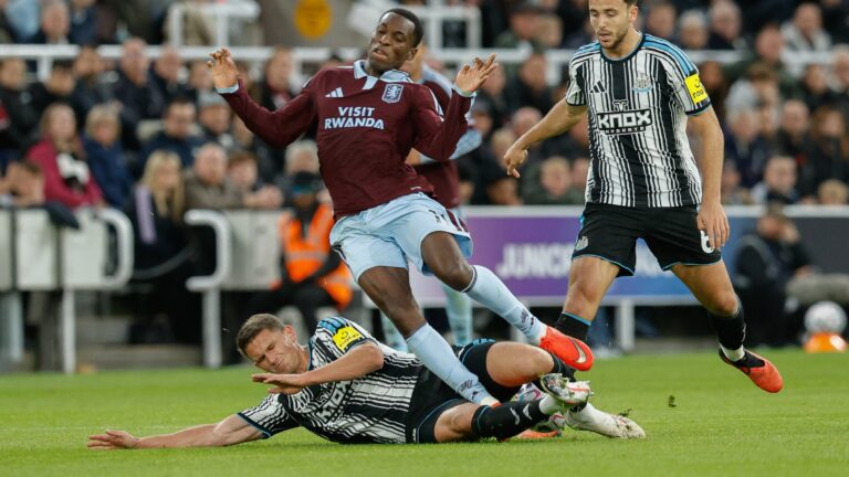 Sven Botman tackling Nicolas Jackson