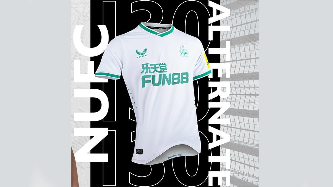 green and white newcastle shirt